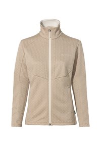Giacca beige chiaro con zip, caratterizzata da un design a nido d'ape testurizzato, colletto alto e zip bianca. Presenta il logo sul lato sinistro del petto e un'etichetta di accento verde.