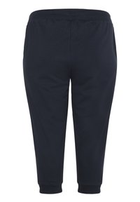Pantaloni jogger di un blu scuro, con vita e polsini elastici, realizzati in tessuto morbido, caratterizzati da un design semplice e liscio. Senza tasche visibili.