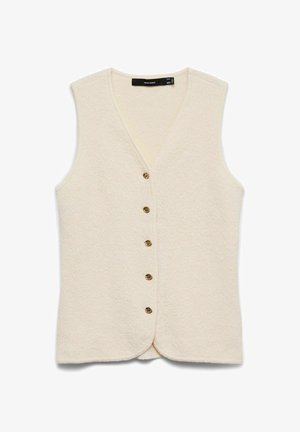 Veste en tricot sans manches de couleur crème avec col en V et cinq boutons marron sur le devant.