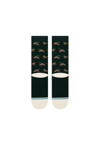 Calcetines de color verde oscuro con un patrón repetido de manos y pequeñas hojas, con la puntera y el talón blancos, y una fina raya azul en el puño.