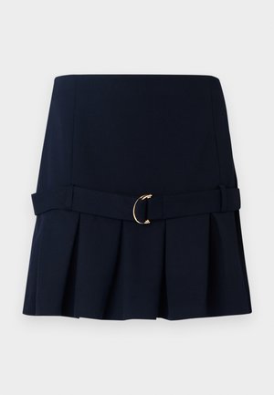 Navy pleated skirt with a fitted waist, featuring a wide belt and gold-tone buckle accent. Made from a smooth fabric with a structured design.