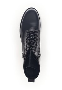 Black leather ankle boot with lace-up front, rounded toe, side zippers, and textured accents. Smooth finish with a minimalistic design.