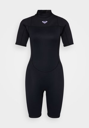 Black short-sleeve wetsuit with a high neckline, made from stretch neoprene. Features reinforced stitching and a subtle logo on the chest.