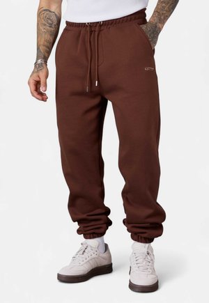 JOGGER ESSENTIAL - Tracksuit bottoms - downtownbrown