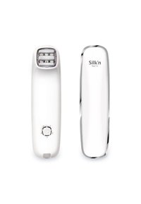 Facial device with white plastic body and chrome accents. Features an LED panel with four lights and a power button with five settings.