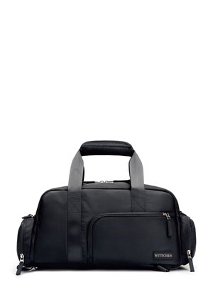 Borsa da viaggio rettangolare nera con due manici superiori, tasca frontale con zip, tasche laterali e etichetta "WITTCHEN" sulla tasca frontale.