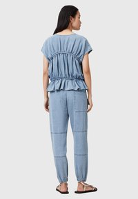 AllSaints - Jeansy Zwężane