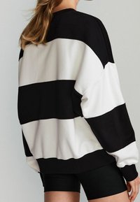 Next Felpa - black