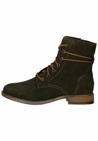 Stivaletto alla caviglia in suede verde scuro con lacci e cuciture marroni, punta rotonda e tacco basso impilato. Cerniera laterale per un facile accesso.