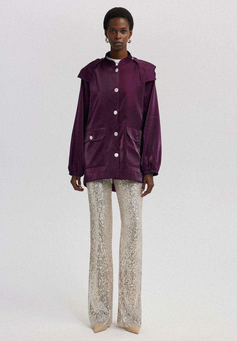 Touché Privé Regenjas paars Touché Privé Regenjas paars