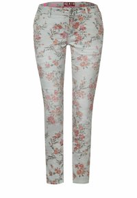 Blommiga denimbyxor i ljusblått med ett blommönster som innehåller rosa och gröna nyanser. Slim fit med diskreta detaljer längs sidorna.