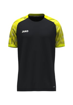 T-shirt de sport noir avec des manches courtes jaunes comportant des motifs géométriques noirs et le nom de la marque JAKO en blanc sur la poitrine avant gauche.