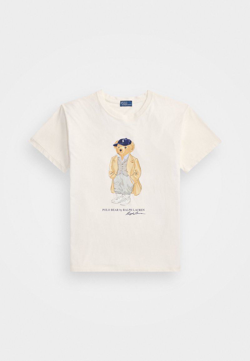Cream cotton t-shirt featuring a graphic illustration of a bear in a jacket and cap, with text beneath reading "POLO BEAR by RALPH LAUREN."