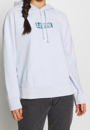 Felpa con cappuccio di colore azzurro chiaro, dotata di tasca frontale, con logo stampato "LEVI'S". Tessuto morbido con polsini e orlo a coste.