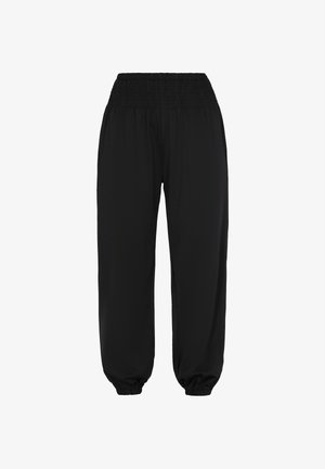Pantalons de jogging noirs, amples, avec une taille élastique et des poignets fuselés, conçus pour le confort et un style décontracté.