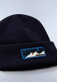 Navy knit beanie with folded brim, featuring an embroidered logo patch in blue and white, depicting mountains with brown accents.