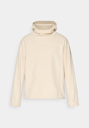 Beige pullover with a high collar, soft fleece material, and long sleeves. Features side pockets and a simple textured design.