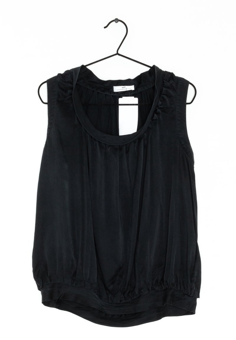 Black sleeveless blouse with a round neckline, gathered detailing, and elastic hem. Smooth texture, hangs from a black wire hanger.