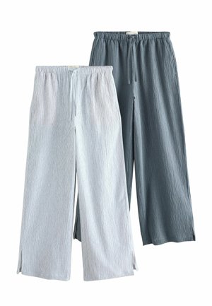 Two pairs of wide-leg pants with elastic waistbands and drawstrings, one in light gray and the other in dark gray with textured fabric.