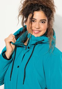 Ulla Popken HYPRAR TRIPLE FUNCTION - Waterproof jacket - turquoise