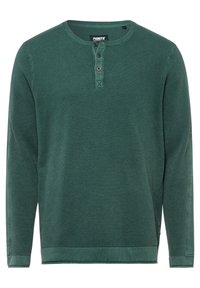 Zelená košile s dlouhými rukávy vyrobená z texturované látky, s kulatým výstřihem, tříknoflíkovou légou a pružnými manžetami a lemem.