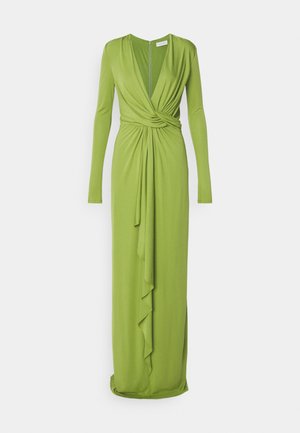 Μακρύ πράσινο φόρεμα από μαλακό ύφασμα. Διαθέτει βαθύ V-λίγκο, μακριά μανίκια, ραμμένη μέση, με περίσσεια υφάσματος μπροστά για επιπλέον λεπτομέρεια.