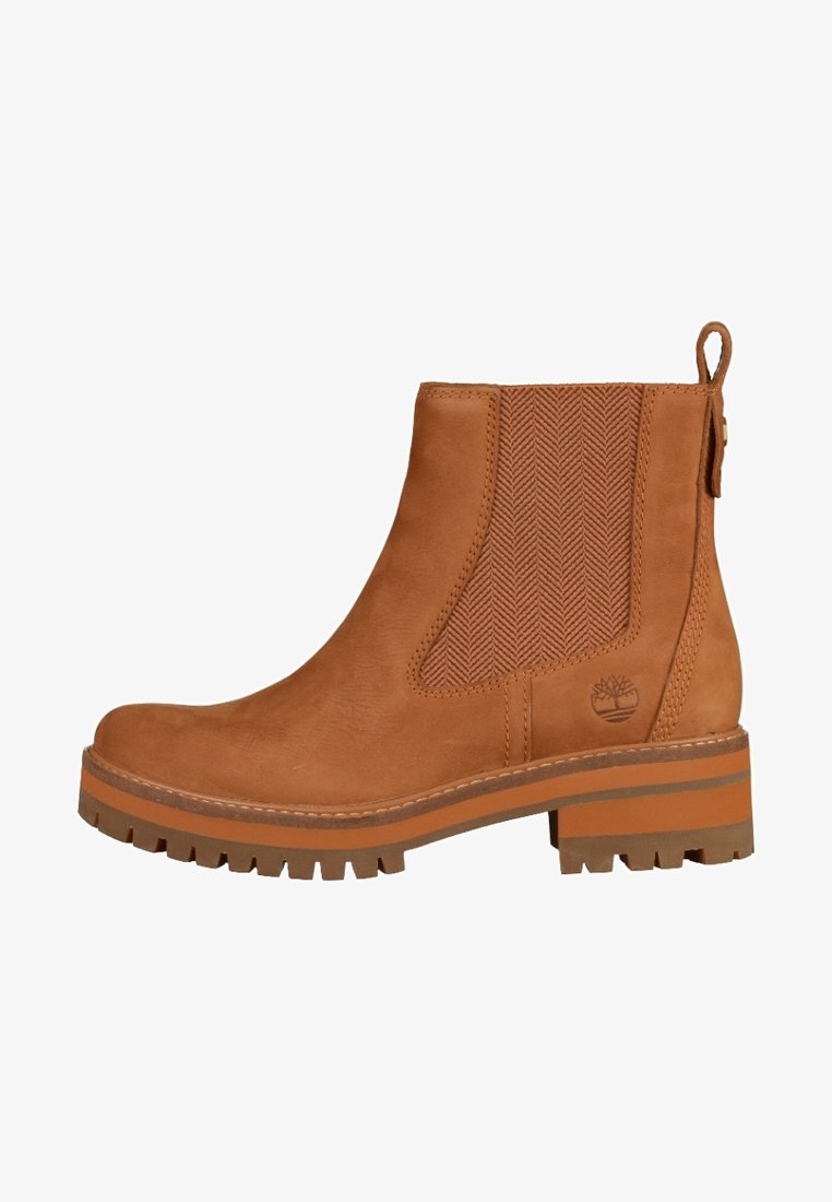 Bottine en cuir couleur tan avec panneau latéral élastique, languette au talon, semelle crantée et petit talon bloc.