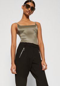 Vero Moda Petite VMEMMA SLIM - Trousers - black