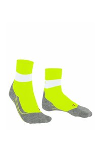 Helle gelbe Knöchelsocken mit weißen und grauen Akzenten, in einem Paar präsentiert, wobei ihre lebendige Farbe und das sportliche Design hervorgehoben werden.