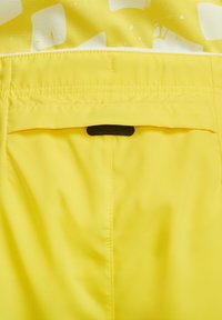 Nike Performance Urheilushortsit - yellow