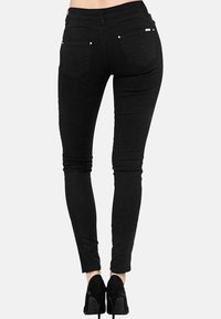 Elara STRETCH - Vaqueros slim fit - schwarz