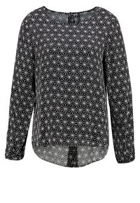 Svart långärmad skjorta med ett geometriskt vitt mönster, rundad halsringning och rundad nederkant; mjukt tyg med lätt lyster.