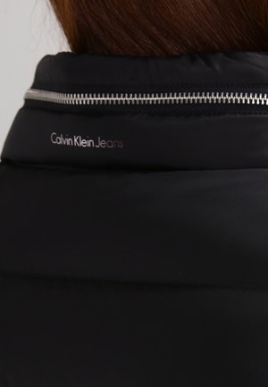 Chaqueta de plumas - black