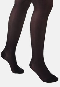 Collants opaques noirs avec une texture lisse, présentant un renfort au niveau de la pointe et un design sans couture s'étendant de la cheville à la mi-cuisse.