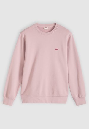 Hele roosa pika varrukaga põhiõla pikkusega pusa, millel vasakul rinnal väike punane Levi’si logo, näidatud helel ja tasasel taustal.