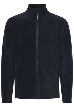 Marineblaue Fleecejacke mit hohem Kragen, durchgehendem Reißverschluss und seitlichen Taschen. Weiche Textur mit glatter Oberfläche.