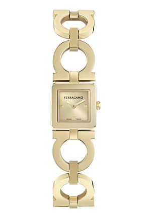 Goldene Ferragamo-Armbanduhr mit quadratischem Zifferblatt, minimalistischem Zifferblatt und charakteristischem Armband mit kreisförmigen und G-förmigen Gliedern.