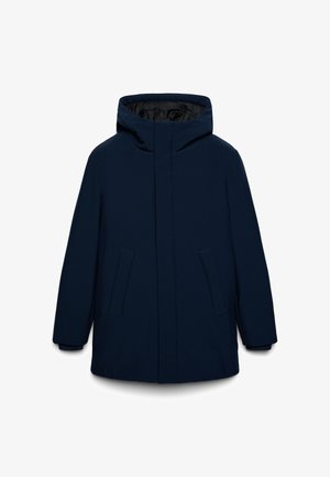 Navy blue puffer coat with a high collar, concealed zipper, and two front pockets. Smooth outer material with a contrasting black lining.