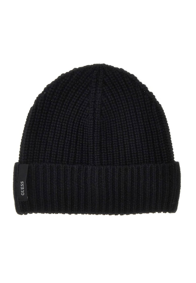 Donker marineblauwe gebreide beanie met geribbelde structuur. Heeft een opgerolde rand en een klein zwart label met witte tekst aan de zijkant.