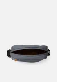 Timberland Taška s příčným popruhem - ombre blue