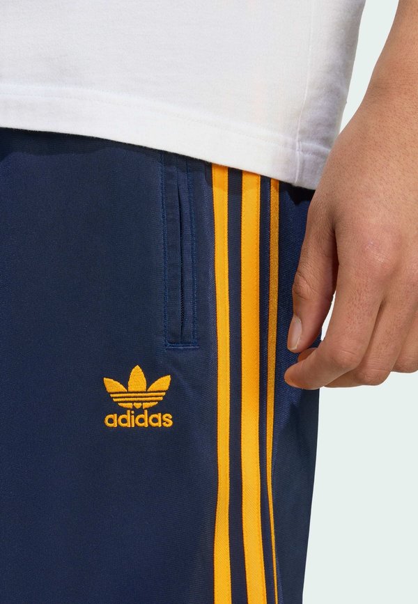 FIREBIRD - Tracksuit bottoms - night indigo   crew orange2