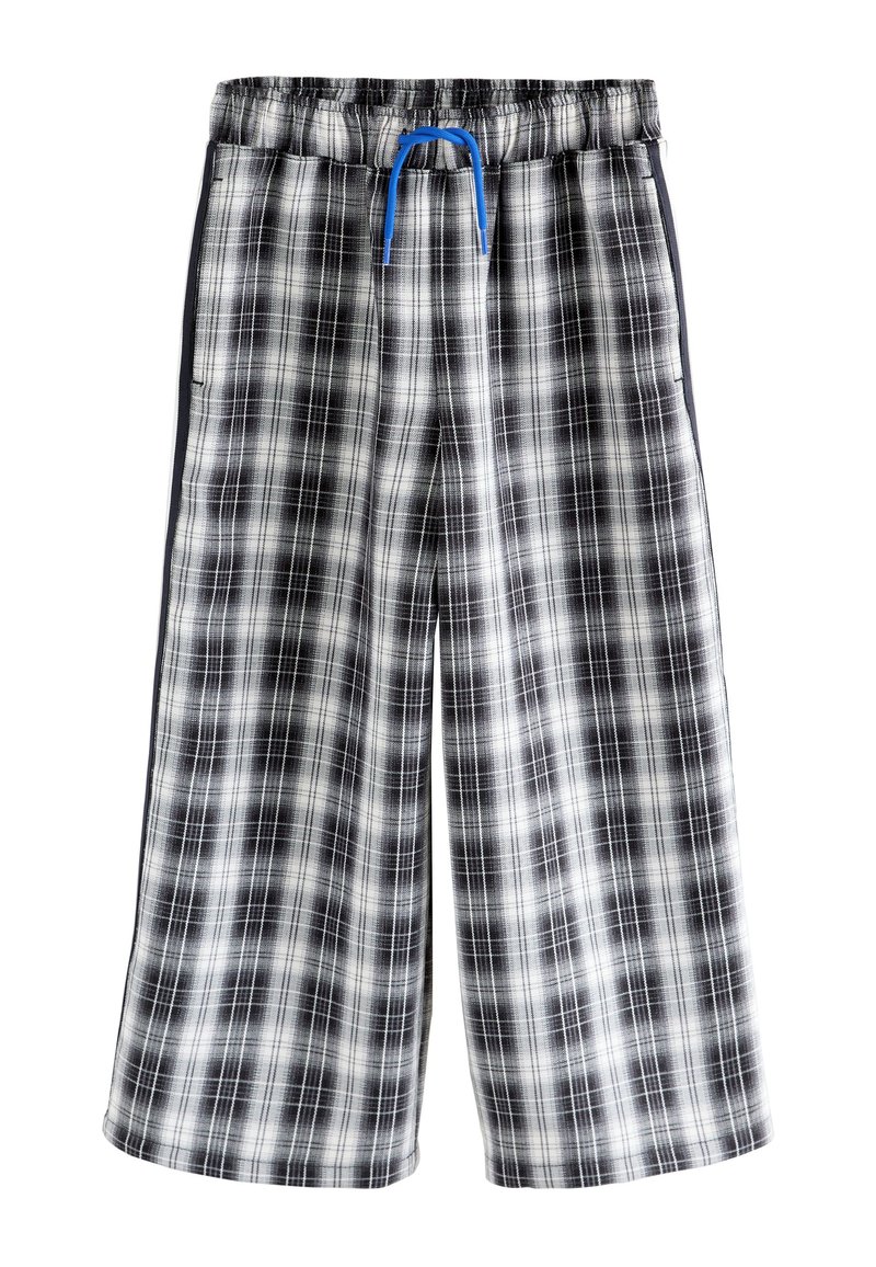 Pantalon à carreaux noir et blanc à coupe ample, doté d'une ceinture élastique et d'un cordon bleu. Tissu texturé avec poches latérales.