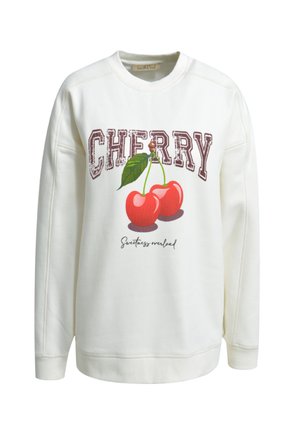 White sweatshirt featuring a "CHERRY" print with two red cherries and green leaves, accented by "Sweetness overload" text in black.