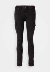 Svarta cargobyxor med smal passform, tillverkade av denim. Har sidsfickor, ribbade knädetaljer och elastiska cuffs vid anklarna.