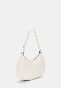 White leather shoulder bag with a curved shape, a zipper closure, and an adjustable strap. Smooth texture with minimal hardware details.