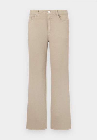 Beige flared teksad, mis on valmistatud pehmest puuvillast. Omab klassikalist viit taskut, nupuga sulgemist ja korralikku õmblust ääredel.