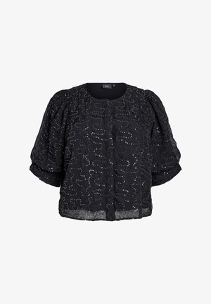 Mustapaita, jossa on tekstuuri, puffeilla hihoilla ja pyöreällä kaula-aukolla. Koristeltu kimalluksilla pyörivässä mallissa kauttaaltaan.