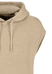 Beige ärmelloser Hoodie mit einer großen Kapuze, vorderem Kordelzug und einem strukturierten Stoff. Verfügt über rohe Armausschnitte und eine lockere Passform.
