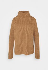 Beige ribbat stickad tröja med hög hals och långa ärmar. Designen har en avslappnad passform och en något oversized silhuett.