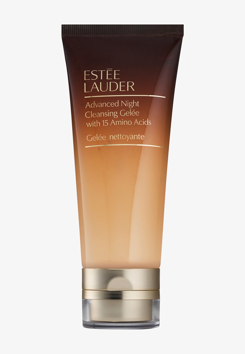 Gelée nettoyante avancée Estée Lauder dans un tube dégradé, passant d'un marron foncé à un ambre clair, avec des accents dorés à la base.
